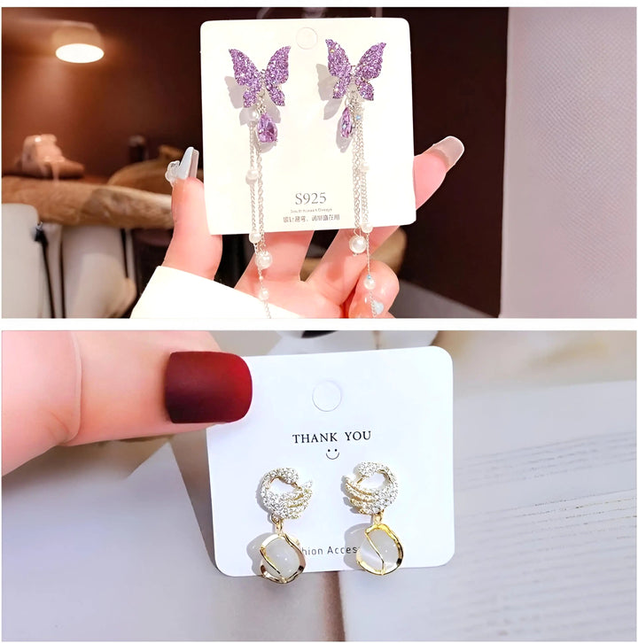 dazzle21 set of two earrings featuring purple butterfly crystal dangles and gold crescent moon pearl drop studs