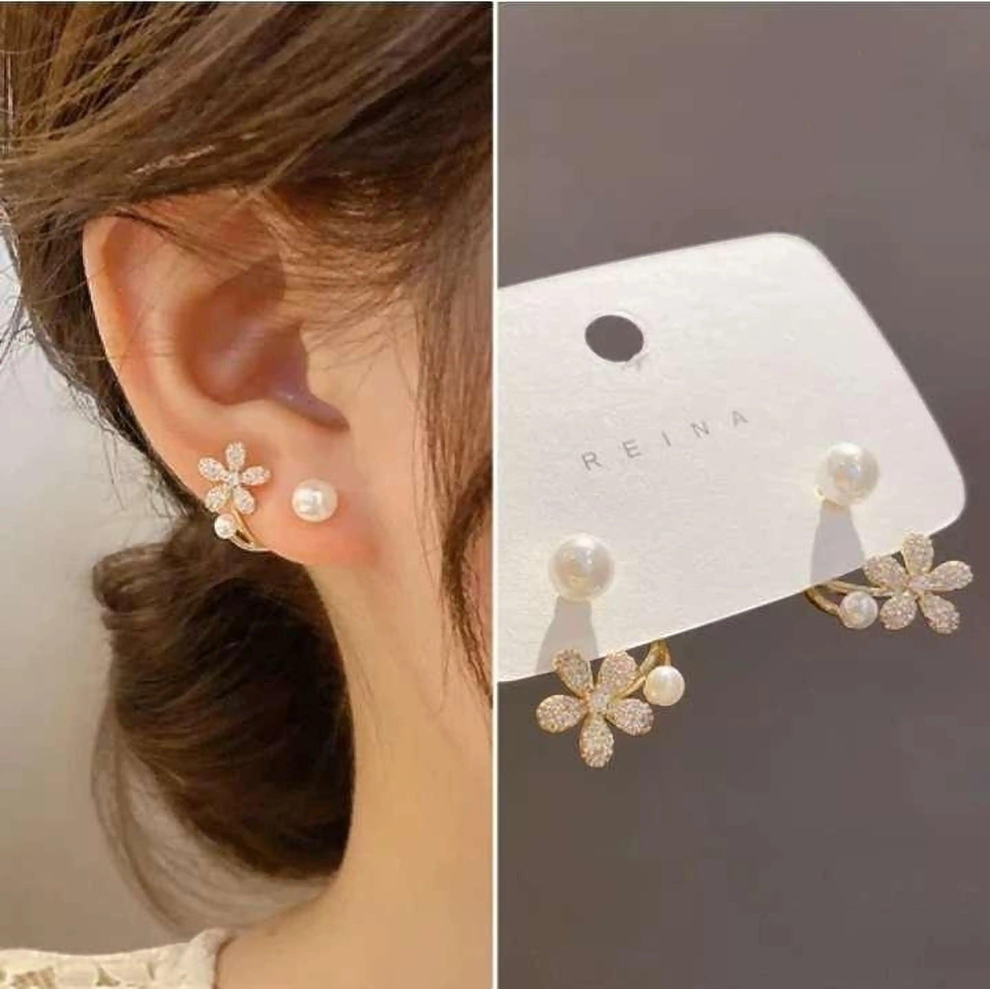 dazzle21 gold-tone daisy stud earrings with sparkling crystals and white pearl accents worn on a model