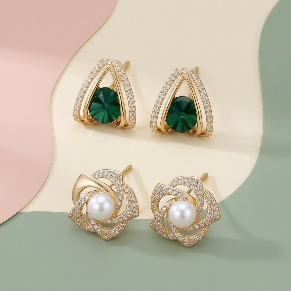 dazzle21 set of two gold-tone stud earrings featuring emerald green stones and white pearls with cubic zirconia accents