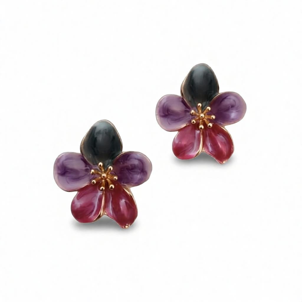 dazzle21 handcrafted floral stud earrings featuring green, purple, and ruby enamel petals with gold center details.