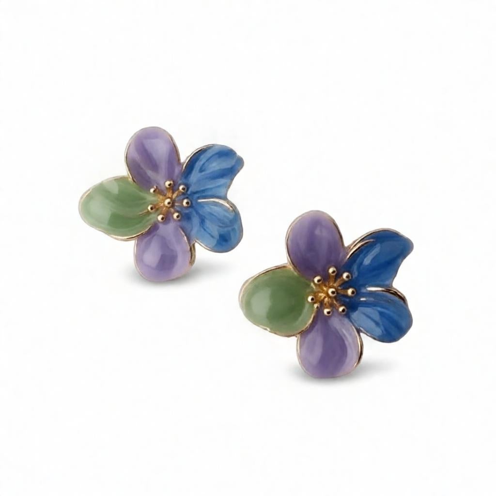 dazzle21 handcrafted floral stud earrings featuring green, purple, and blue enamel petals with gold center details.