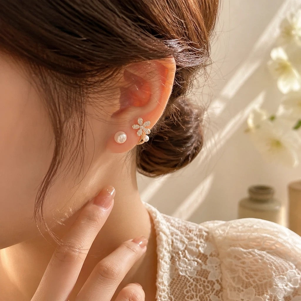 dazzle21 floral pearl and cubic zirconia stud earrings worn on a woman with a lace top in soft natural light