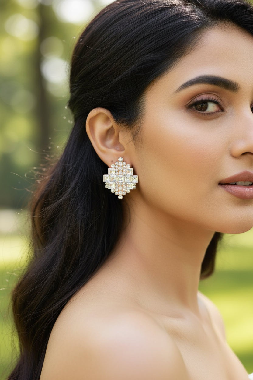 dazzle21 geometric crystal stud earrings in rose gold finish worn by a woman, featuring a layered sparkling design.