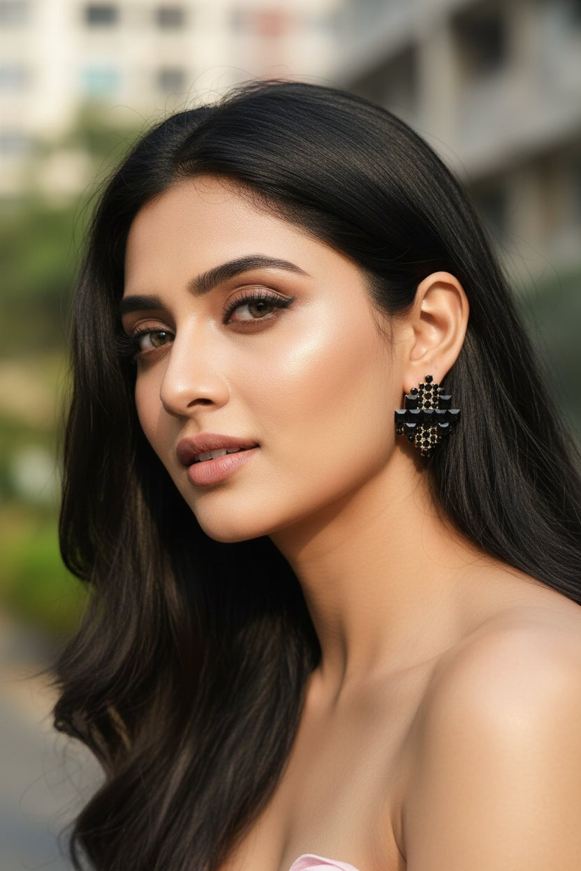 dazzle21 geometric crystal stud earrings in rose gold finish worn by a model with elegant layered design