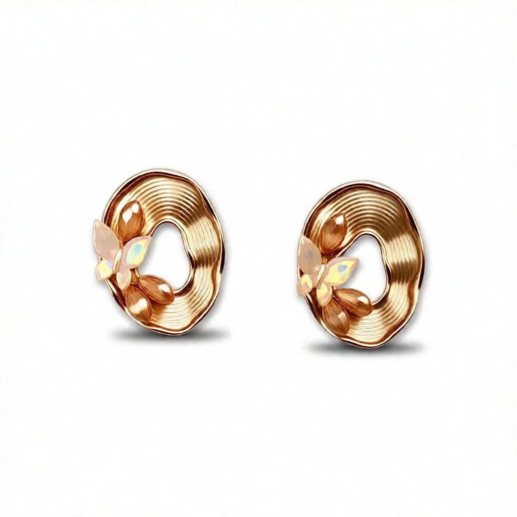 dazzle21 oval stud earrings featuring gold-tone textured frames with iridescent butterfly and petal accents