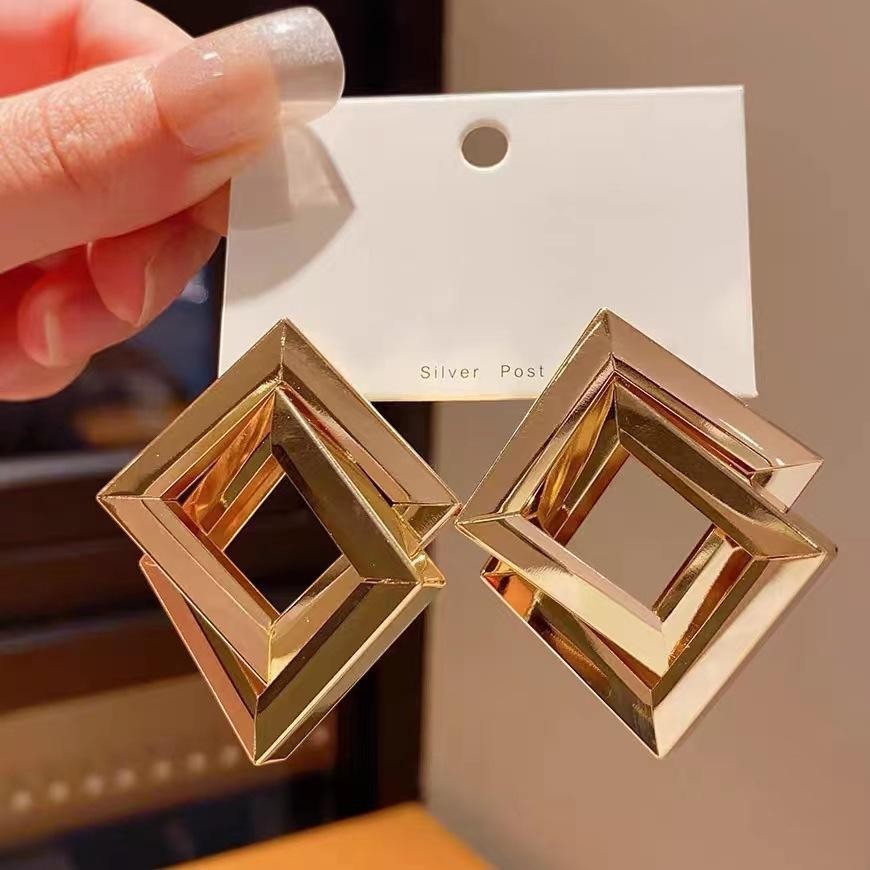 dazzle21 geometric square statement earrings in a polished gold-tone finish with a layered open frame design.