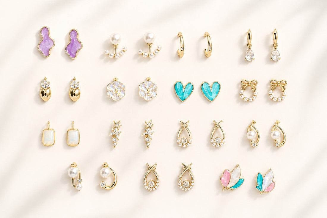dazzle21 12-pair fashion earring set featuring gold-tone studs, hoops, and drop earrings with pearls and colorful accents