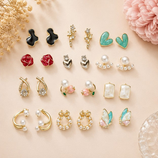dazzle21 12-pair fashion earring set featuring gold-tone, pearl, floral, heart, and butterfly designs in a gift box