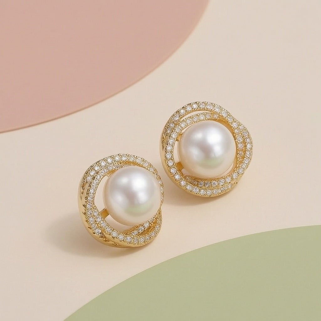 dazzle21 gold stud earrings featuring a central white pearl surrounded by a halo of sparkling cubic zirconia stones