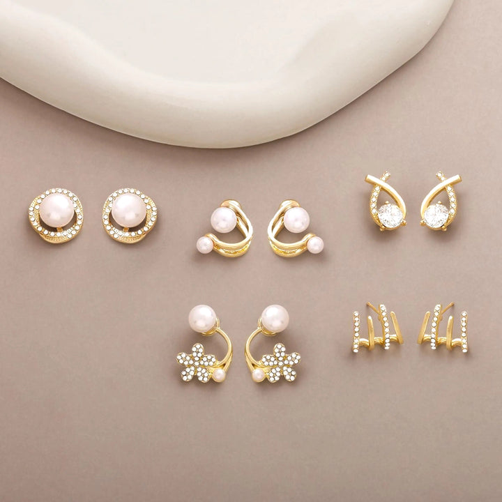 dazzle21 gold-tone alloy stud earring set featuring faux pearls, zirconia crystals, star, and leaf motifs
