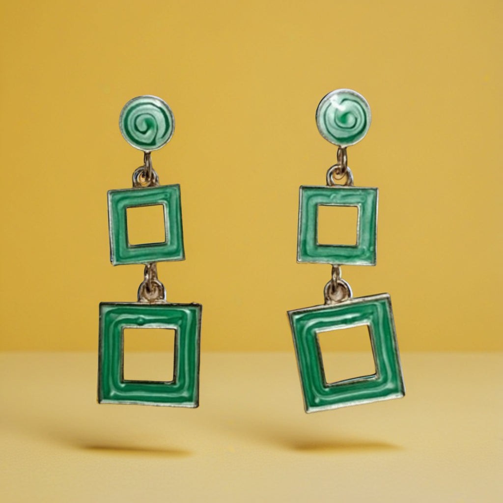 dazzle21 green geometric square drop earrings with a modern double-square design on a yellow background