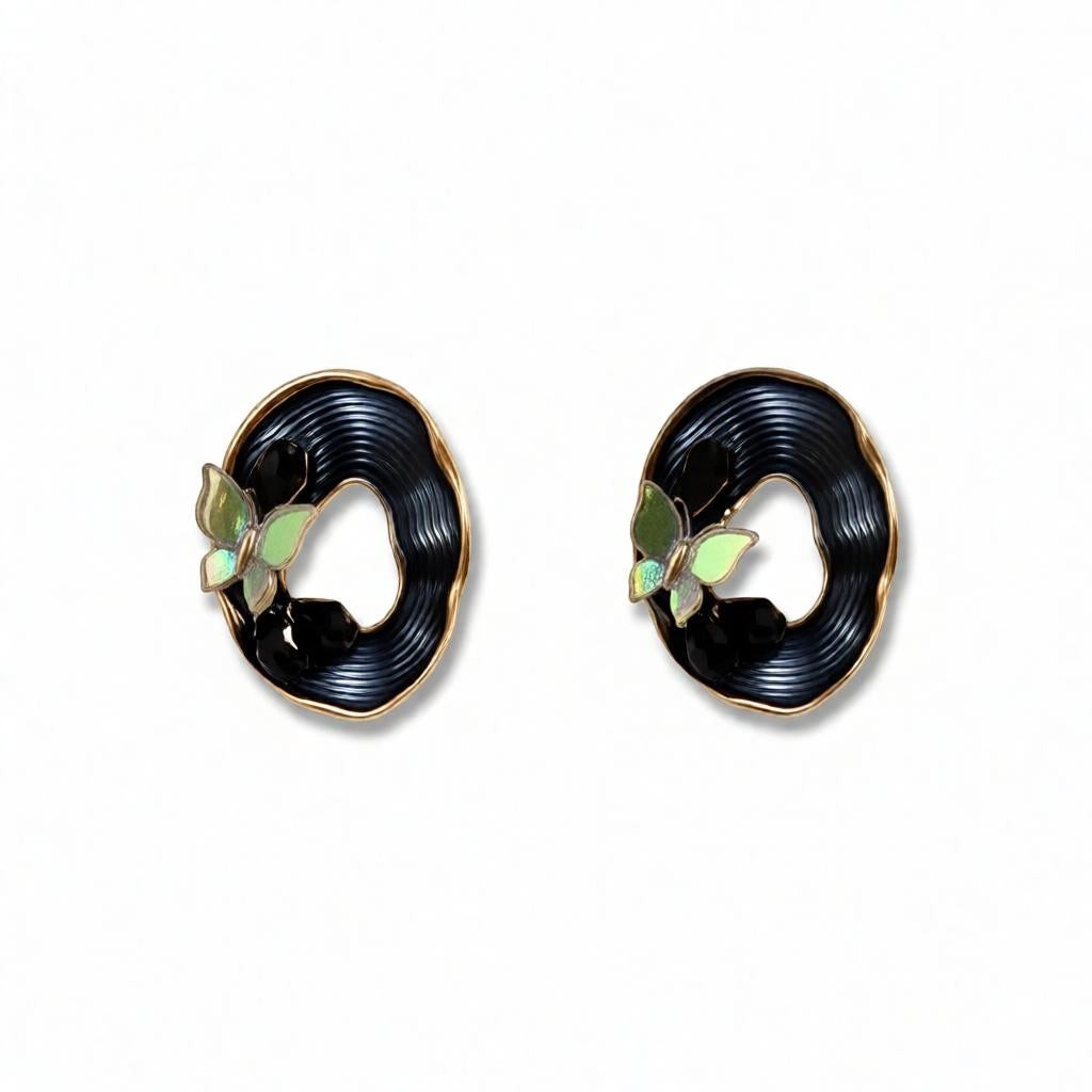 dazzle21 oval stud earrings featuring black textured frames with iridescent butterfly accents and gold-tone edges