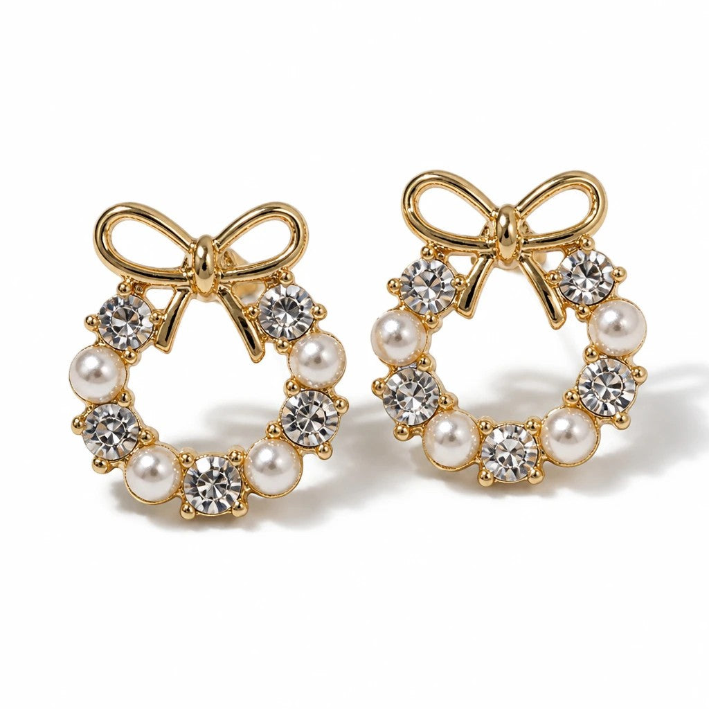 dazzle21 gold-tone alloy stud earrings featuring a wreath design with white pearls and clear crystals and a bow detail