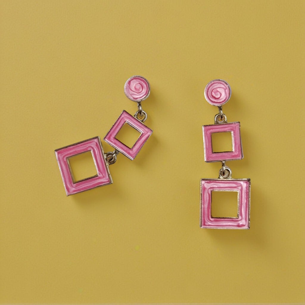 dazzle21 pink geometric square drop earrings with a modern double-square design on a yellow background