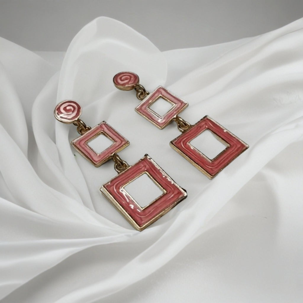 dazzle21 pink enamel geometric square drop earrings with a double-square design on a white satin background