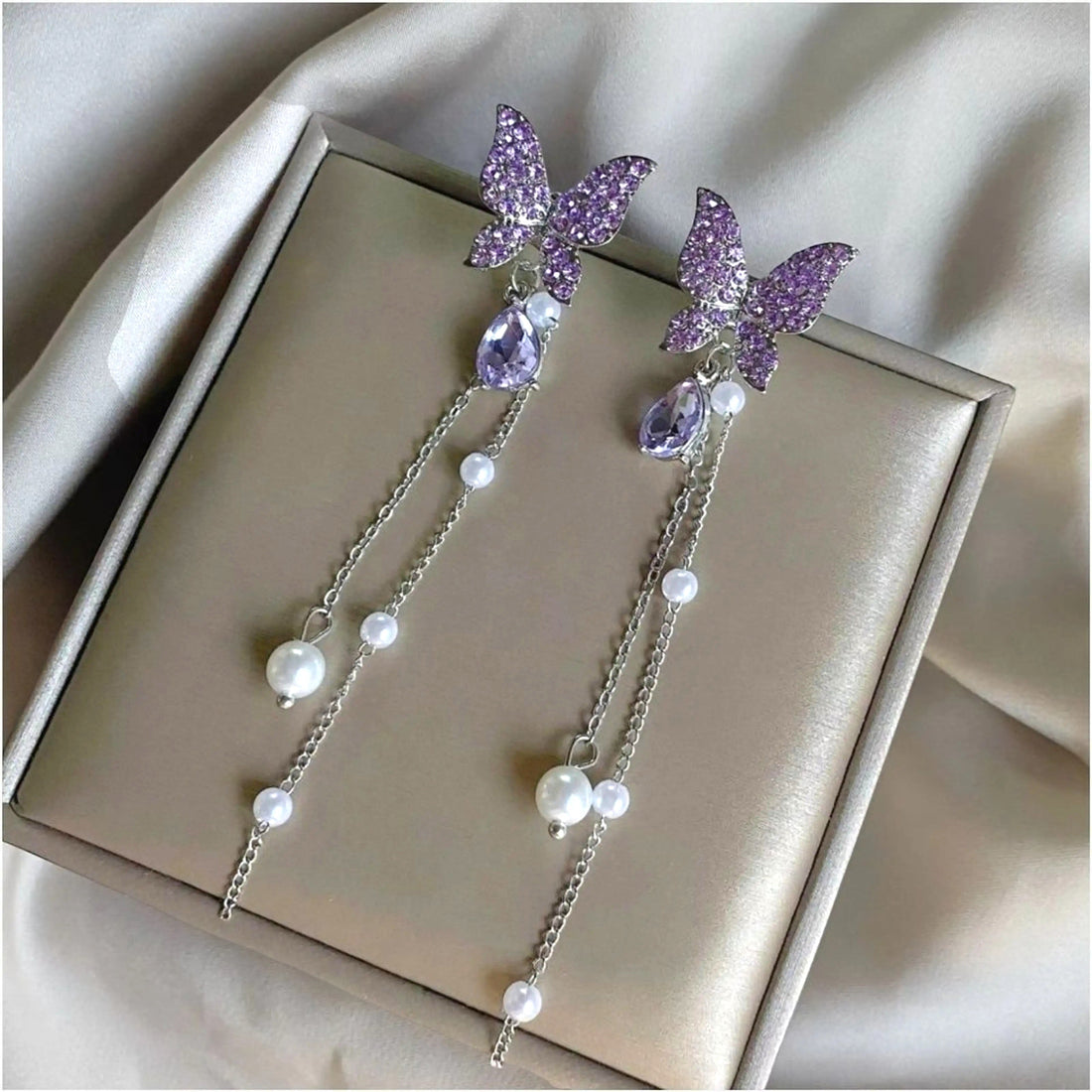 dazzle21 purple butterfly drop earrings with crystal accents and dangling pearls on a silver chain
