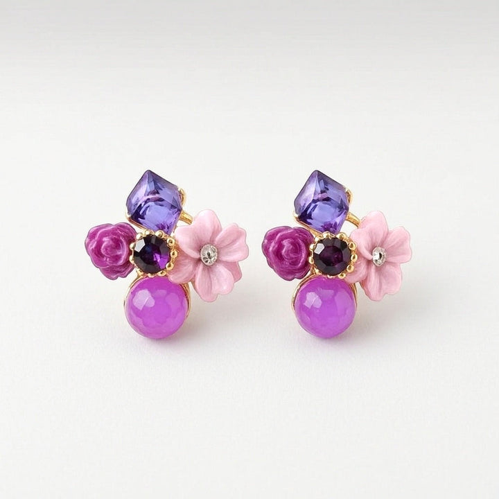 dazzle21 floral stud earrings featuring purple crystals, pink flower petals, and round beads in a cluster design