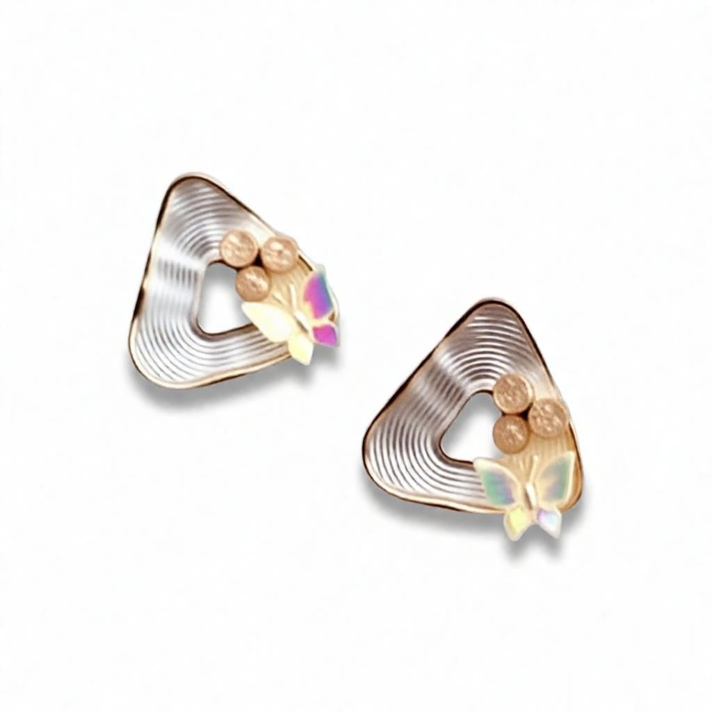 dazzle21 geometric triangle stud earrings with ribbed gold finish, peach pearls, and iridescent butterfly accents.