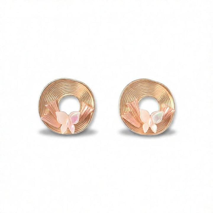 dazzle21 Blossom Glow rose gold stud earrings featuring a circular spiral design with delicate pastel butterflies.