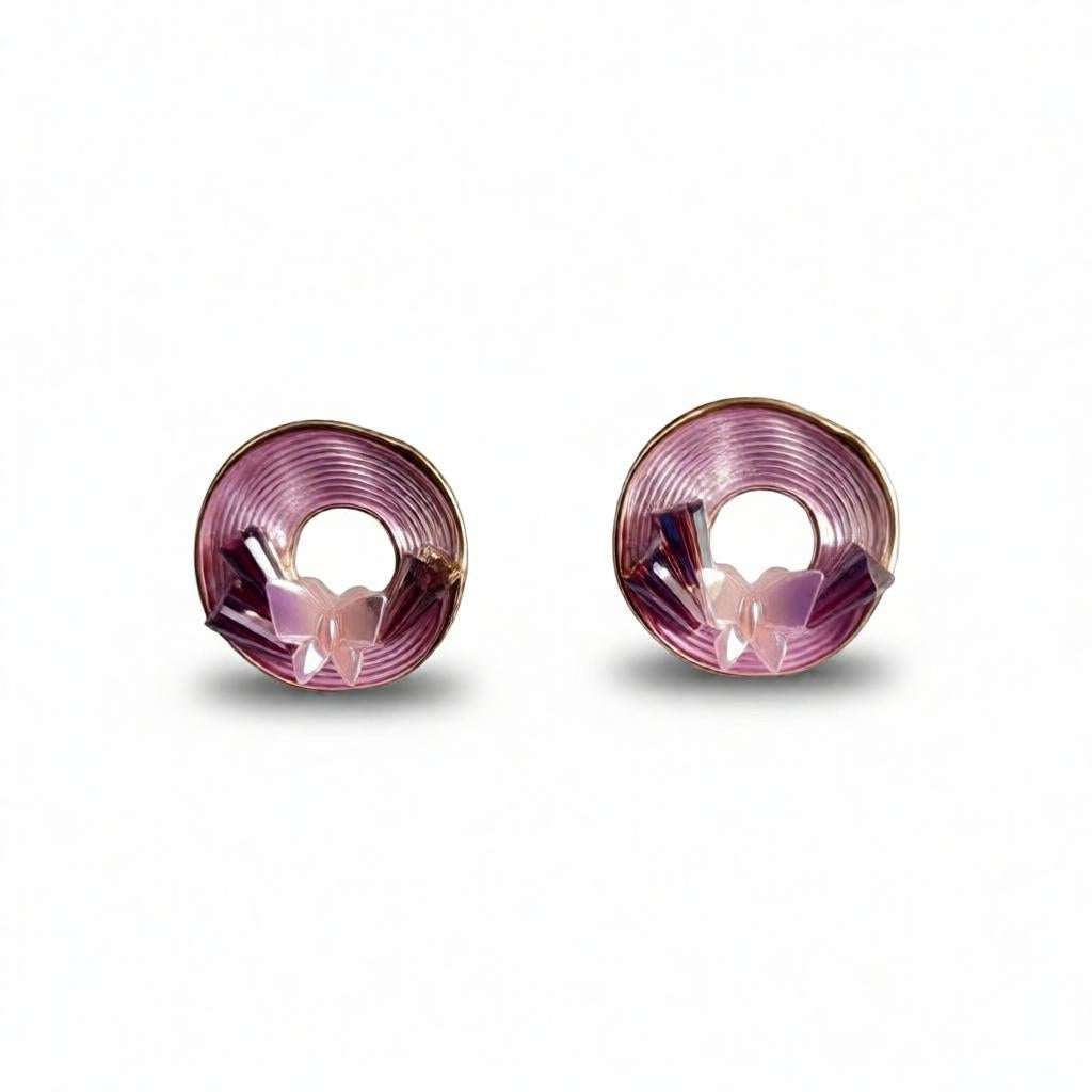 dazzle21 Blossom Glow rose gold stud earrings featuring a circular spiral design with delicate pastel butterfly accents.