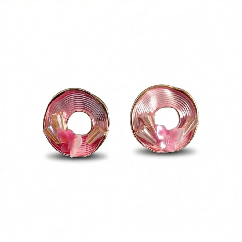 dazzle21 Blossom Glow rose gold stud earrings featuring a circular spiral design with delicate pastel butterfly accents.