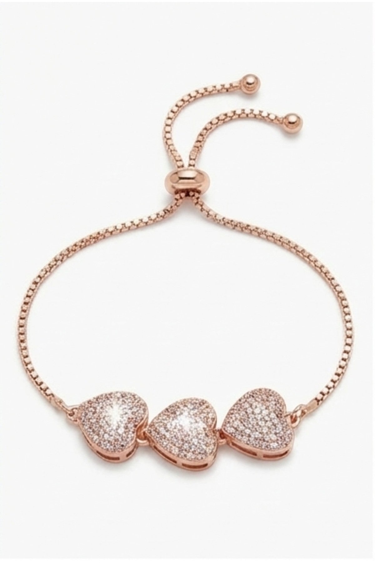 dazzle21 rose gold-tone triple heart bracelet with pavé crystal stones and an adjustable sliding bolo clasp