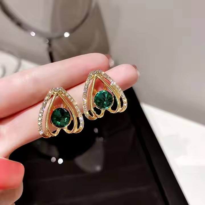 Emerald Glow Geometric Stud Earrings